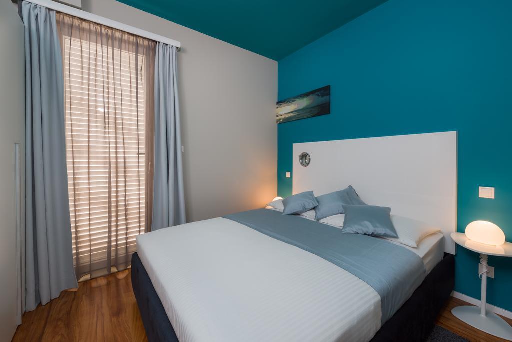 Apartments Villa Azzurra Bol Quarto foto